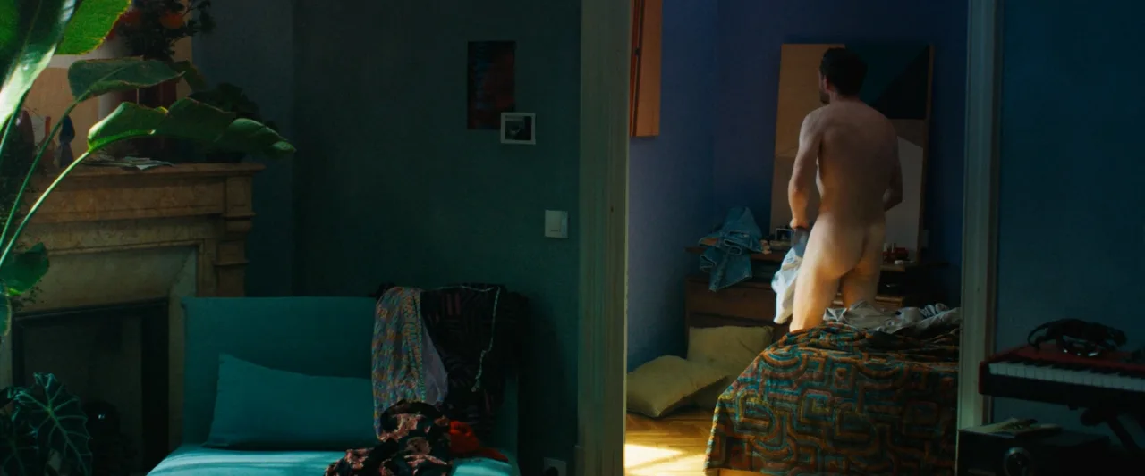 Jamie Bell naked and crouching on a bed in Rosebush Pruning - photo 2
