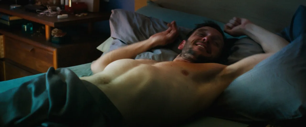 Jamie Bell naked and crouching on a bed in Rosebush Pruning - photo 1