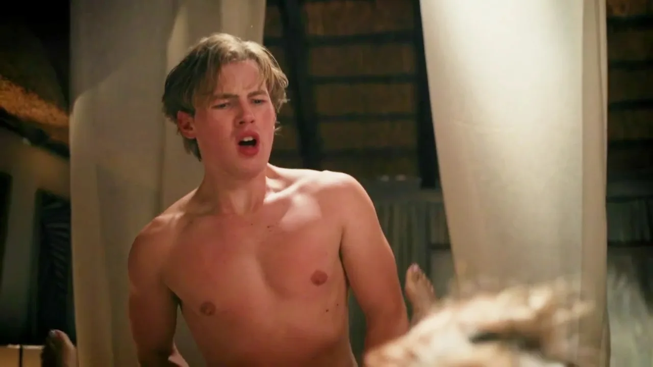 Liam Bosman’s bare ass on display in rustic bedroom, khaki shorts low on hips, warm lighting, intimate vibe - photo 10