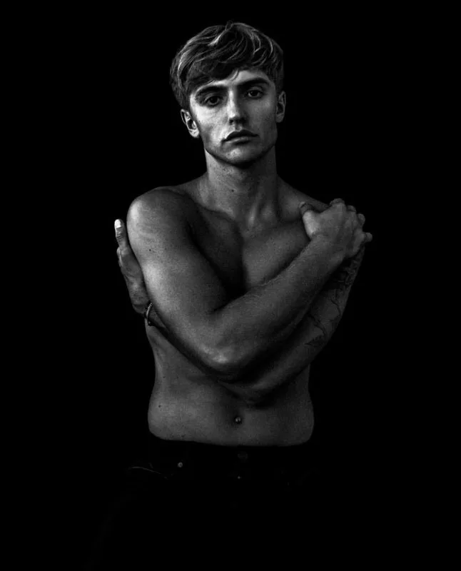 Hart Denton shirtless with bandana and smoky gaze in moody black and white - photo 6