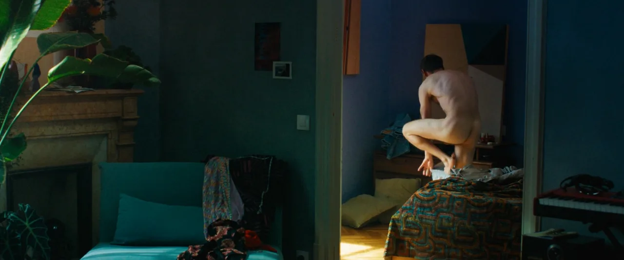 Jamie Bell naked and crouching on a bed in Rosebush Pruning - photo 4
