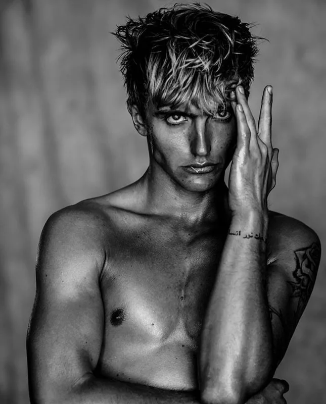 Hart Denton shirtless with bandana and smoky gaze in moody black and white - photo 3