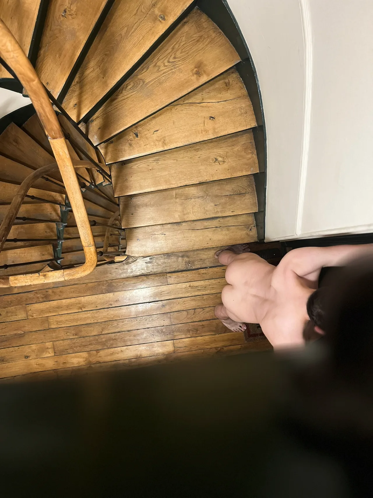 Naughty lad caught bare-assed on the spiral stairs, cheeky pose for the camera - photo 2