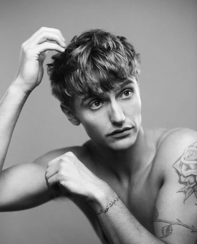 Hart Denton shirtless with bandana and smoky gaze in moody black and white - photo 2